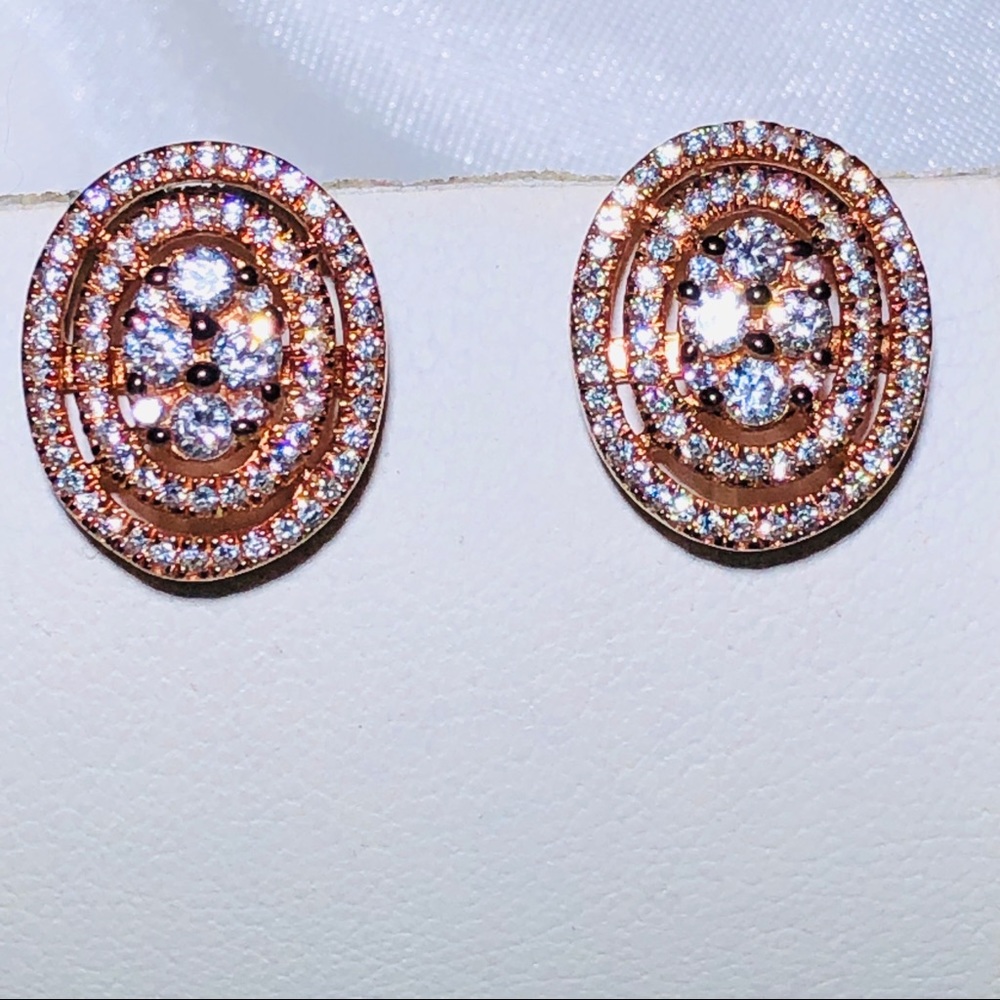 Earrings with crystal-diamonds set in rose metal